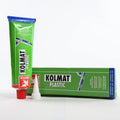 Герметик GRIFFON KOLMAT PLASTIC — тюбик стоїть поруч із коробкою та двома знятими ковпачками